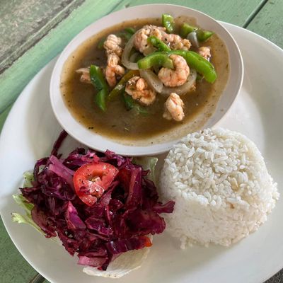 shrimp soup with red beet salad beside it