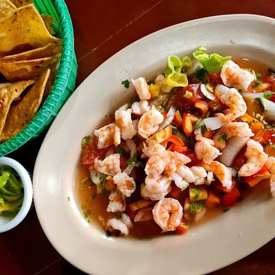 shrimp ceviche on beige plate