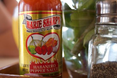 habanero pepper sauce bottle on table